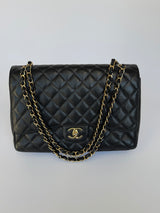 Chanel Maxi Classic Double Flap In Black Caviar GHW