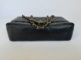 Chanel Maxi Classic Double Flap In Black Caviar GHW