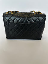 Chanel Vintage XL Maxi Flap Bag In Black Lambskin