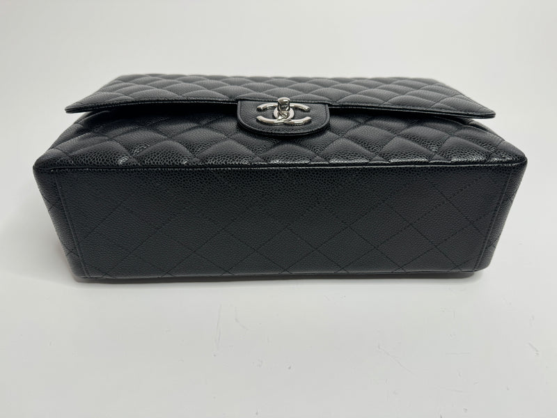 Chanel Maxi Classic Double Flap In Black Caviar With Silver Hardware